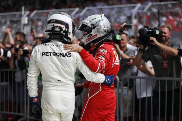 July 9, 2017 - Spielberg, Austria - VALTTERI BOTTAS of Finland and Mercedes AMG Petronas F1 Team hugs SEBASTIAN VETTEL of Germany and Scuderia Ferrari after the 2017 Formula 1 Austrian Grand Prix in Spielberg, Austria. F1 2017 - Austrian Grand Prix - Bottas wins - ZUMAg147 20170709_zap_g147_020 Copyright: xJamesxGasperottix