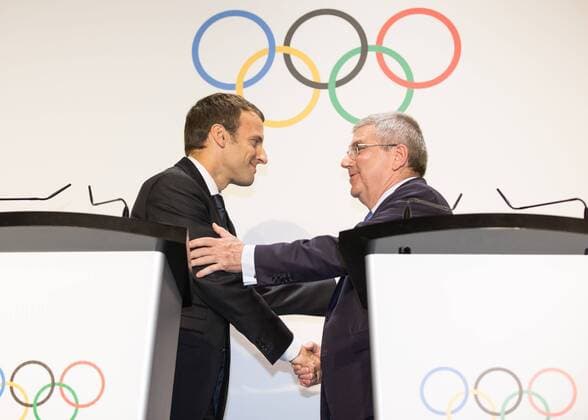 (170711) -- , July 11,2017 -- French President Emmanuel Macron (L) shakes hands with International Olympic Committee (IOC) President Thomas Bach at the Olympic Museum in , Switzerland, July 10, 2017. Members of IOC will hold a session for presentations by the campaign teams for Los Angeles and Paris on July 11th and 12th. Xu Jinquan) (SP)SWITZERLAND- Olympic Games Olympische Spiele Olympia OS 2024 BID LAUSANNE 
