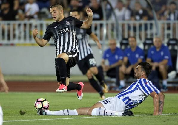 (170712) -- BELGRADE, July 12, 2017 -- Partizan s Nemanja Mihajlovic (L) vies with Buducnost s Janko Simovic during UEFA Champions League qualifying football match between Partizan and Buducnost in Belgrade, Serbia on July 11. 2017. Partizan won 2-0.) (SP)SERBIA-BELGRADE-SOCCER-UCL- QUALIFICATIONS-PARTIZAN-BUDUCNOST PredragxMilosavljevic 
