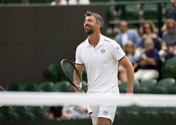 July 13th 2017, All England Lawn Tennis and Croquet Club, London, England; The Wimbledon Tennis Championships, Day 10; Goran Ivanisevic (CRO) smiling during his match with Wayne Ferreira (RSA) against Jeremy Bates (GBR) and Chris Wilkinson (GBR) xRolandxHarrisonx  ActionPlus11900786