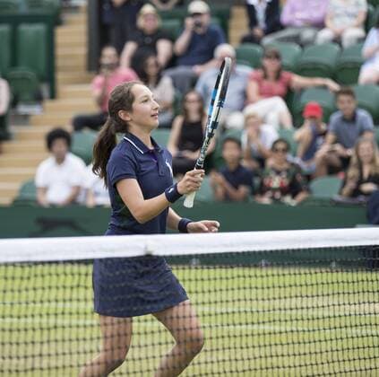 July 13th 2017, All England Lawn Tennis and Croquet Club, London, England; The Wimbledon Tennis Championships, Day 10; A Ball Girl with the racket of Michael Llordra (FRA) plays in his match with Monsour Bahrami (IRI) against Greg Rusedski (GBR) and Fabrice Santoro (FRA) xRolandxHarrisonx  ActionPlus11900836