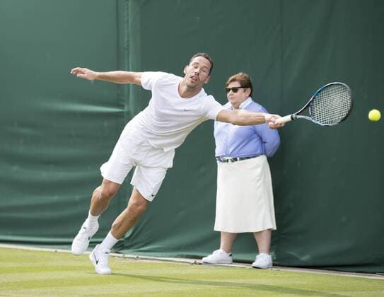July 13th 2017, All England Lawn Tennis and Croquet Club, London, England; The Wimbledon Tennis Championships, Day 10; Michael Llordra (FRA) stretches to hit a forehand return during his match with Monsour Bahrami (IRI) against Greg Rusedski (GBR) and Fabrice Santoro (FRA) xRolandxHarrisonx  ActionPlus11900838