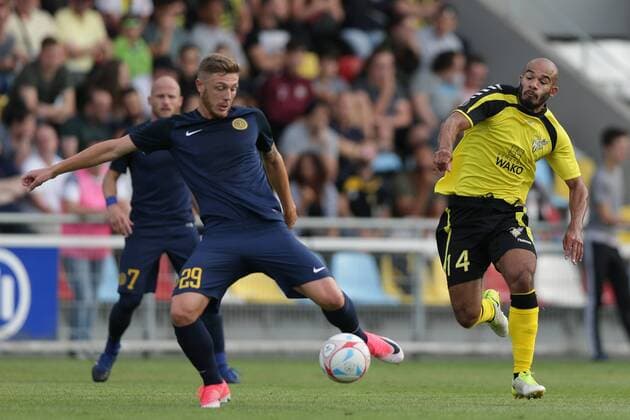 Fussball UEFA Europa League, Europa-Ligue, Europa League 2017 - 2018 13.07.2017, UEFA Europa League 2017-2018, Qualification Second Round, First Game, Luxemburg, Stade Municipal de la Commune de Differdange, Progres Niederkorn, Proges Niederkorn (LUX) - AEL Limassol (CYP) vl: Bogdan Mitrea (AEL Limassol 29) - Emmanuel Francoise (Niederkorn 14) 
