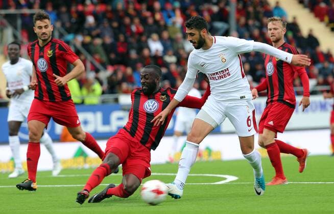 Tolga Cigerci of Galatasaray and Fouad Bachirou of Ostersund during the UEFA Europaleague Qualifier 3rd round, 1st leg match between Ostersund and Galatasaray on July 13, 2017 in Ostersund , Sweden. Final score : Ostersund 2 - Galatasaray 0 