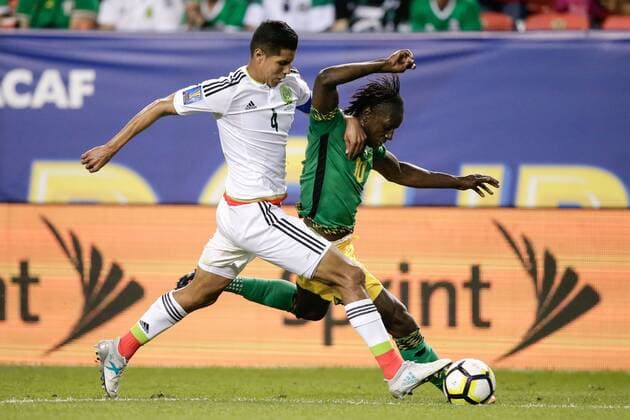 Mexico defender Hugo Ayala (L) and Jamaica forward Darren Mattocks (R) battle for the ball in the second half in their CONCACAF Gold Cup match at Authority Field in Denver, Colorado, USA, 13 July 2017. Mexico - Jamaica !ACHTUNG: NUR REDAKTIONELLE NUTZUNG!  Copyright: xIsaiahxJ.xDowningx GDC123 20170714-636356132606136944