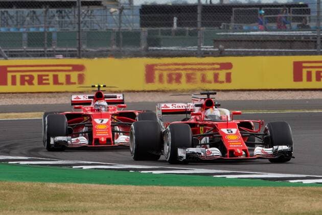 July 14th 2017, Silverstone, Northamptonshire, England; British Formula One Grand Prix, Free Practice; Scuderia Ferrari driver Sebastian Vettel drives with the new cockpit protection, whilst Scuderia Ferrari driver Kimi Raikkonen does not xTimxWilliamsx  ActionPlus11901090