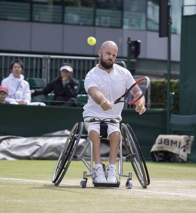 July 14th 2017, All England Lawn Tennis and Croquet Club, London, England; The Wimbledon Tennis Championships, Day 11; Stefan Olsson (SWE) hits a backhand return to Shingo Kunieda (JPN) during their match xRolandxHarrisonx  ActionPlus11901155
