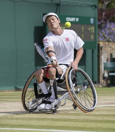 July 14th 2017, All England Lawn Tennis and Croquet Club, London, England; The Wimbledon Tennis Championships, Day 11; Shingo Kunieda (JPN) hits a forehand return to Stefan Olsson during their match xRolandxHarrisonx  ActionPlus11901159