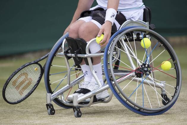 July 14th 2017, All England Lawn Tennis and Croquet Club, London, England; The Wimbledon Tennis Championships, Day 11; The sports wheelchair of Alfie Hewitt (GBR) with tennis balls in the spokes during his match against Gustavo Fernandez (ARG) xRolandxHarrisonx  ActionPlus11901341