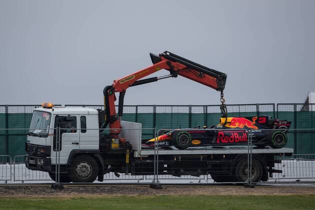 July 15th 2017, Silverstone, Northamptonshire, England; British Formula One Grand Prix, qualification sessions day; The car of Red Bull Racing driver Daniel Ricciardo is carried back to the pits on a lorry xTimxWilliamsx  ActionPlus11902047