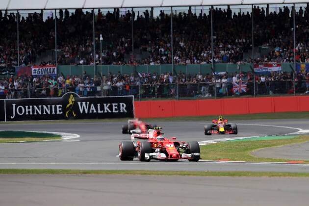 British Grand Prix, Silverstone 13 - 16 July 2017 16.07.2017 - Race, Kimi Raikkonen (FIN) Scuderia Ferrari SF70H leads Max Verstappen (NED) Red Bull Racing RB13 and Sebastian Vettel (GER) Scuderia Ferrari SF70H 