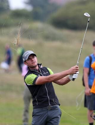 July 19th 2017, Royal Birkdale Golf Club, Southport, England; The 146th Open Golf Championship, Final Practice Day; Laurie Canter (amateur) (ENG) strikes his approach shot to the third green xDavidxBlunsdenx  ActionPlus11903722