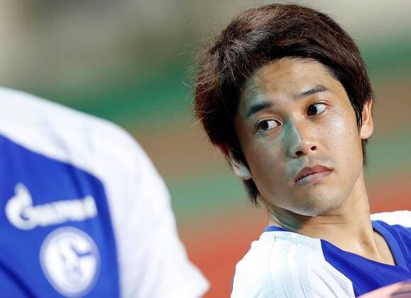 (170719) -- ZHUHAI, July 19, 2017 -- Atsuto Uchida of FC Schalke 04 looks on ahead of a pre-season soccer match between Bundesliga s FC Schalke 04 and Turkish Super League champion Besiktas JK at Zhuhai Sports Center Stadium in Zhuhai, south China s Guangdong Province, July 19, 2017. FC Schalke 04 won 3-2. ) (SP)CHINA-ZHUHAI-SOCCER-SCHALKE 04-BESIKTAS(CN) WangxLili 