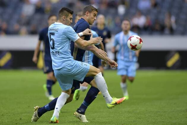 170720 Zeljeznicars Danijel Graovac i kamp om bollen med AIK:s Eero Markkanen under fotbollsmatchen i kvalet till Europa League mellan AIK och Zeljeznicar den 20 juli 2017 i Stockholm.  Copyright: SIMONxHASTEGARD BB170720BB146