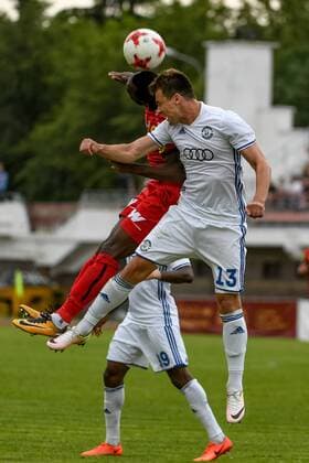 SOCCER - UEFA EL quali, Brest vs Altach BREST,BELARUS,20.JUL.17 - SOCCER - UEFA Europa League qualification, FK Dinamo Brest vs SCR Altach. Image shows Nicolas Moumi Ngamaleu (Altach) and Maksim Vitus (Brest). GEPAxpictures xOliverxLerch