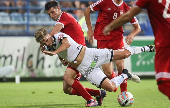 SOCCER - UEFA EL quali, Podgorica vs Sturm PODGORICA,MONTENEGRO,20.JUL.17 - SOCCER - UEFA Europa League qualification, FK Mladost Podgorica vs SK Sturm Graz. Image shows Nikola Vukcevic (Podgorica) and Philipp Zulechner (Sturm). GEPAxpictures xChristianxWalgram