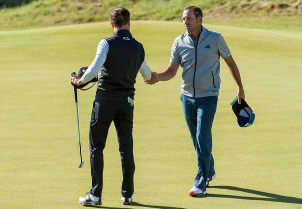 20th July 2017, Royal Birkdale Golf Club, Southport, England; The 146th Open Golf Championship, First round; Zak Johnson (USA) and Sergio Garcia (ESP) shake hands on the 18th green xDavidxBlunsdenx  ActionPlus11904425