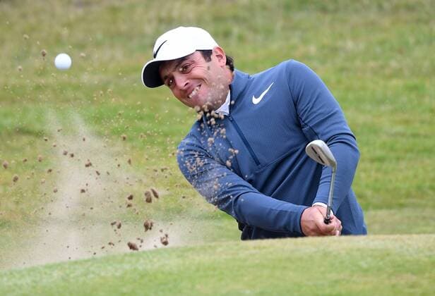 Italy s Francesco Molinari hits out of the bunker green on the 7th green on Day two at the 146th Open Championship, Southport on July 21, 2017.  LON2017072119 HUGOxPHILPOTT