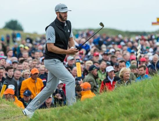 21st July 2017, Royal Birkdale Golf Club, Southport, England; The 146th Open Golf Championship, second round; Dustin Johnson (USA) looks at the contours around the 9th green after hitting his approach shot into gorse xDavidxBlunsdenx  ActionPlus11904477