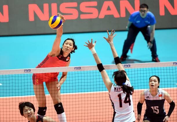 Zhu Ting of China spikes against Ayaka Matsumoto of Japan during the Pool G1-Group 1 match of the FIVB Volleyball World Grand Prix Hong Kong 2017 in Hong Kong, China, 21 July 2017. China defeated Japan 3-1 (25-19, 25-20, 33-35, 25-21). China defeats Japan during FIVB Volleyball World Grand Prix Hong Kong 2017  pbu656153_08