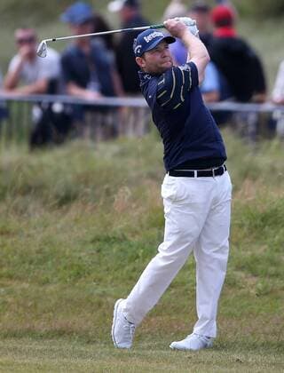 22nd July 2017, Royal Birkdale Golf Club, Southport, England; The 146th Open Golf Championship, third round ; Branden Grace (RSA) watches his approach shot to the 18th green, he needed a par for the record low score of 62 in an Open Championship xDavidxBlunsdenx  ActionPlus11904856