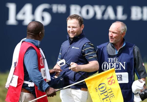 22nd July 2017, Royal Birkdale Golf Club, Southport, England; The 146th Open Golf Championship, third round ; Branden Grace (RSA) is congratulated by his caddie after his record low round of 62 in an Open Championship xDavidxBlunsdenx  ActionPlus11904863