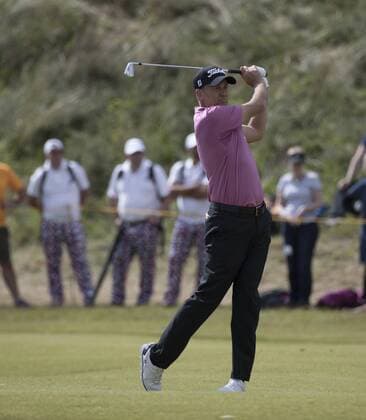 Ian Poulter plays an iron at the 146th Open Championship at Royal Birkdale Golf Club, Southport, England on July 22, 2017.  LON2017072204 HUGOxPHILPOTT