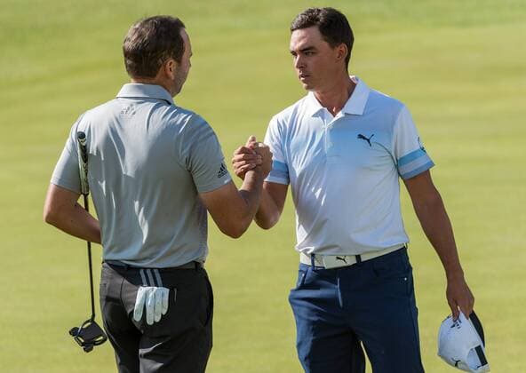 22nd July 2017, Royal Birkdale Golf Club, Southport, England; The 146th Open Golf Championship, third round ; Sergio Garcia (ESP) and Rickie Fowler (USA) shake hands on the 18th green xDavidxBlunsdenx  ActionPlus11905242