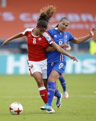 (170723) -- DOETINCHEM, July 23, 2017 -- Cinzia Zehnder (L) of Switzerland vies with Sigridur Gardarsdottir of Iceland during the UEFA Women s EURO 2017 soccer tournament Group C match between Switzerland and Iceland at the Vijverberg Stadium in Doetinchem, the Netherlands, on July 22, 2017. Switzerland won 2-1. ) (wll) (SP)THE NETHERLANDS-DOETINCHEM-SOCCER-UEFA-WOMEN S EURO-SUI VS ISL YexPingfan 