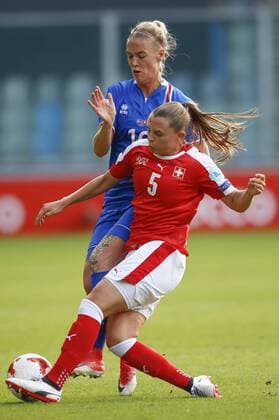 (170723) -- DOETINCHEM, July 23, 2017 -- Noelle Maritz (R) of Switzerland vies with Dagny Brynjarsdottir of Iceland during the UEFA Women s EURO 2017 soccer tournament Group C match between Switzerland and Iceland at the Vijverberg Stadium in Doetinchem, the Netherlands, on July 22, 2017. Switzerland won 2-1. ) (wll) (SP)THE NETHERLANDS-DOETINCHEM-SOCCER-UEFA-WOMEN S EURO-SUI VS ISL YexPingfan 
