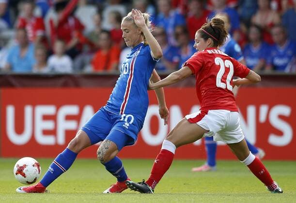 (170723) -- DOETINCHEM, July 23, 2017 -- Dagny Brynjarsdottir (L) of Iceland vies with Vanessa Bernauer of Switzerland during the UEFA Women s EURO 2017 soccer tournament Group C match between Switzerland and Iceland at the Vijverberg Stadium in Doetinchem, the Netherlands, on July 22, 2017. Switzerland won 2-1. ) (wll) (SP)THE NETHERLANDS-DOETINCHEM-SOCCER-UEFA-WOMEN S EURO-SUI VS ISL YexPingfan 
