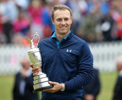 23rd July 2017, Royal Birkdale Golf Club, Southport, England; The 146th Open Golf Championship, fourth round ; Jordan Spieth (USA) smiles as he holds the claret jug trophy as Champion Golfer of the Year xDavidxBlunsdenx  ActionPlus11905756