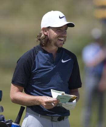 23rd July 2017, Royal Birkdale Golf Club, Southport, England; The 146th Open Golf Championship, fourth round ; Tommy Fleetwood (ENG) shares a joke with his caddie on the 8th fairway xDavidxBlunsdenx  ActionPlus11905774