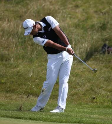 23rd July 2017, Royal Birkdale Golf Club, Southport, England; The 146th Open Golf Championship, fourth round ; Hideki Matsuyama (JPN) plays a pitch shot from the light rough on the second hole xDavidxBlunsdenx  ActionPlus11905899