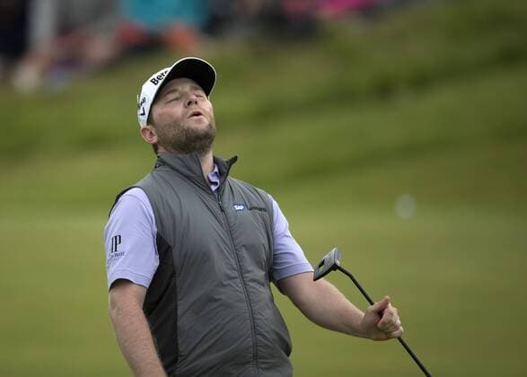 23rd July 2017, Royal Birkdale Golf Club, Southport, England; The 146th Open Golf Championship, fourth round ; Branden Grace (RSA) reacts as his birdie putt on the 11th green lips out xDavidxBlunsdenx  ActionPlus11905919