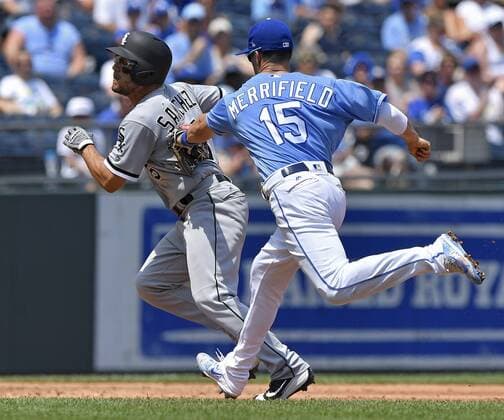 July 23, 2017 - Kansas City, MO, USA - Kansas City Royals second baseman Whit Merrifield runs down Chicago White Sox s Yolmer Sanchez in the third inning after being caught off second on Sunday, July 23, 2017 at Kauffman Stadium in Kansas City, Mo. Chicago White Sox vs. Kansas City Royals - ZUMAm67_ 20170723_zaf_m67_006 Copyright: xJohnxSleezerx