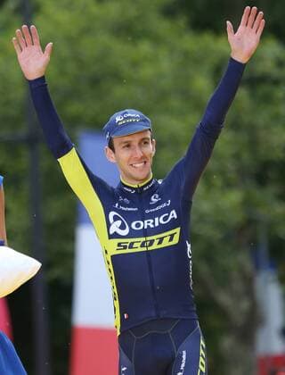 Simon Yates of Great Britain celebrates on the presentation podium after winning Best Young Rider at the Tour de France in Paris on July 23, 2017.  PAR20170723037 DAVIDxSILPA