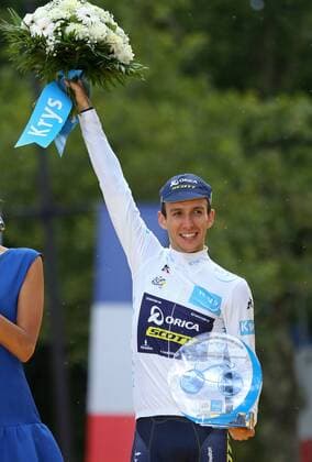 Simon Yates of Great Britain celebrates on the presentation podium after winning Best Young Rider at the Tour de France in Paris on July 23, 2017.  PAR20170723039 DAVIDxSILPA