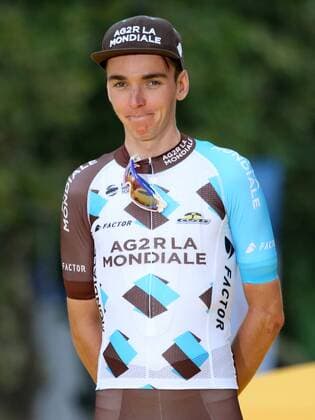 Romain Bardet of France arrives on the presentation podium after finishing third at the Tour de France in Paris on July 23, 2017. Chris Froome of Great Britain claimed his fourth Tour de France victory.  PAR20170723043 DAVIDxSILPA