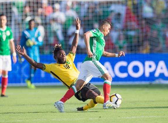July 23, 2017 - Pasadena, California, USA - Pasadena, Ca. - July 23, 2017: The CONCACAF Gold Cup Semi-Final Game, Mexico vs Jamaica. Final score, Mexico 0, Jamaica 1 Owayne Gordon, Orbelin Pineda - ZUMAt139 20170723_zaa_t139_075 Copyright: xDavidxBernalx
