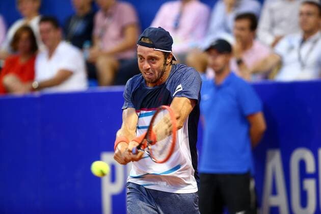 (170724) -- UMAG, July 24, 2017 -- Paolo Lorenzi of Italy returns the ball during men s singles final match against Andrey Rublev of Russia at the ATP Tennis Herren Croatia Open 2017 in Umag, Croatia, on July 23, 2017. Andrey Rublev calimed the title by defeating Paolo Lorenzi with 2-0. ) (SP)CROATIA-UMAG-TENNIS-ATP-CROATIA OPEN SlavkoxMidzor 