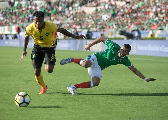 July 23, 2017 - Pasadena, California, U.S - Rodolfo Pizarro 15 of Mexico and Damion Lowe 3 of Jamaica battle for the ball during their Gold Cup Semifinal game at the Rose Bowl in Pasadena, California on Sunday July 23, 2017. Jamaica defeats Mexico, 1-0. Jamaica defeats Mexico, 1-0 - ZUMAp124 20170723_zaa_p124_027 Copyright: xJavierxRojasx