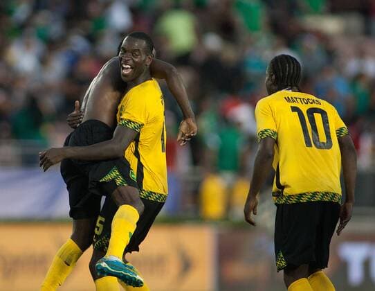(170724) -- PASADENA, July 24, 2017 -- Je-Vaughn Watson (C) of Jamaica hugs his teammate Kemar Lawrence (L) after the semifinal the CONCACAF Gold Cup soccer tournament between Jamaica and Mexico at the Rose Bowl in Pasadena, the United States, on July 23, 2017. Jamaica advanced to the final with 1-0.) (wll) (SP)U.S.-PASADENA-SOCCER-CONCACAF GOLD CUP-SEMIFINAL-JAM VS MEX JavierxRojas 