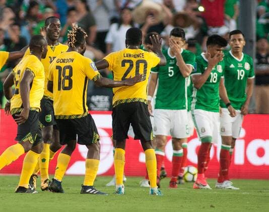 (170724) -- PASADENA, July 24, 2017 -- Players of Jamaica celebrate Kemar Lawrence s goal as players of Mexico look dejected during the semifinal of the CONCACAF Gold Cup soccer tournament between Jamaica and Mexico at the Rose Bowl in Pasadena, the United States, on July 23, 2017. Jamaica advanced to the final with 1-0.) (wll) (SP)U.S.-PASADENA-SOCCER-CONCACAF GOLD CUP-SEMIFINAL-JAM VS MEX JavierxRojas 