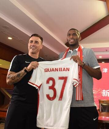Italian head coach Fabio Cannavaro of Tianjin Quanjian Football Club, left, and French football star Anthony Modeste attend a press conference PK Pressekonferenz in Tianjin, China, 17 July 2017. Anthony Modeste  20170717_82160