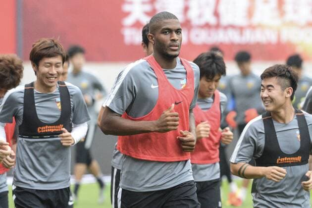 French football star Anthony Modeste, front, and teammates take part in a training session of Tianjin Quanjian Football Club in Tianjin, China, 15 July 2017. Anthony Modeste  pbu653105_15