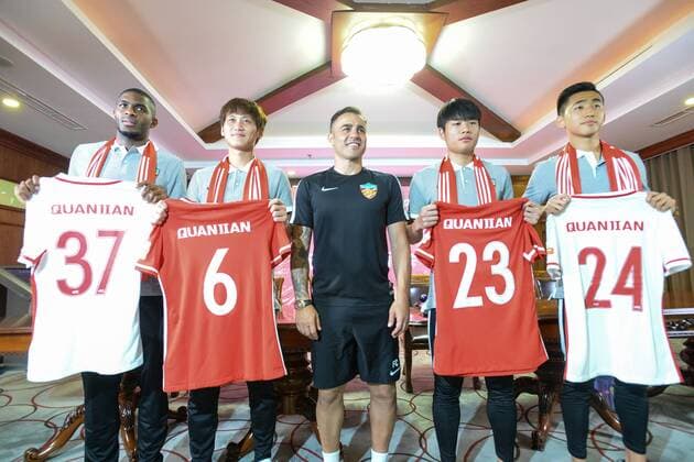 Italian head coach Fabio Cannavaro of Tianjin Quanjian Football Club, center, French football star Anthony Modeste, left, and other new teammates attend a press conference PK Pressekonferenz in Tianjin, China, 17 July 2017. Anthony Modeste  pbu653918_06