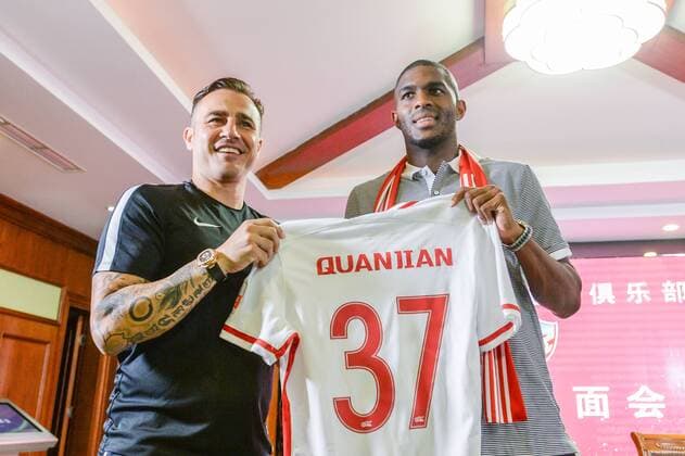 Italian head coach Fabio Cannavaro of Tianjin Quanjian Football Club, left, and French football star Anthony Modeste attend a press conference PK Pressekonferenz in Tianjin, China, 17 July 2017. Anthony Modeste  pbu653918_11