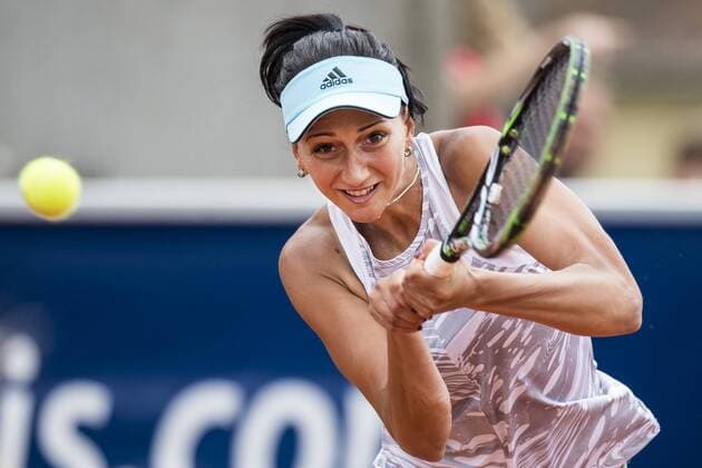170726 Aleksandrina Naydenova, Bulgarien under en dubbelmatch i tennis under dag 4 av Swedish open den 26 juli 2017 i Bastad.  Copyright: PETTERxARVIDSON BB170726PA040