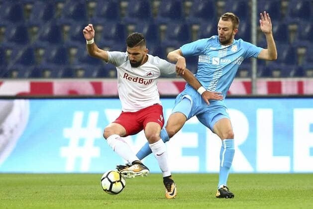 SOCCER - UEFA CL quali, RBS vs Rijeka SALZBURG,AUSTRIA,26.JUL.17 - SOCCER - UEFA Champions League qualification, Red Bull Salzburg vs HNK Rijeka. Image shows Munas Dabbur (RBS) and Josip Misic (Rijeka). GEPAxpictures xFelixxRoittner